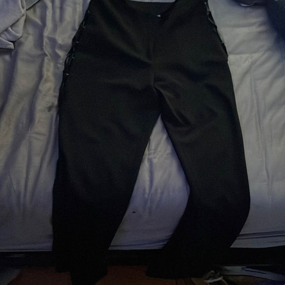 Black pants with lace up the side and slit from knee to ground